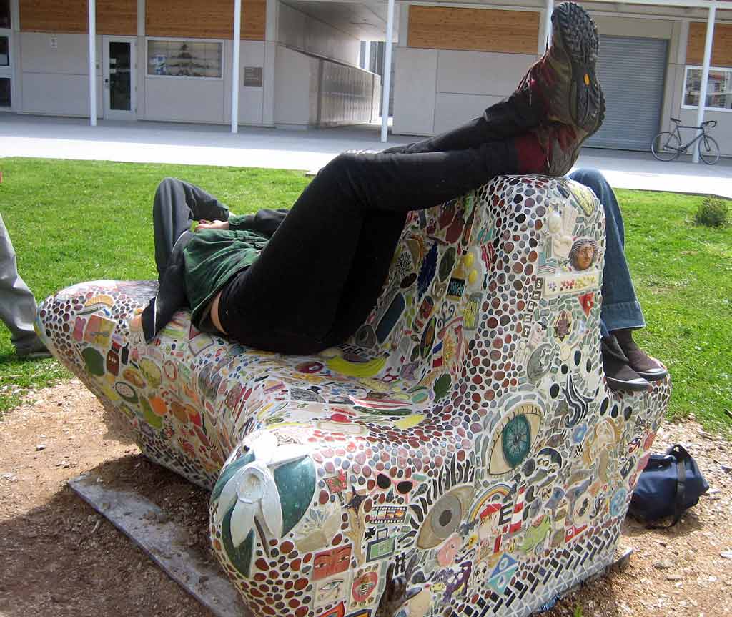 Students using mosaic bench