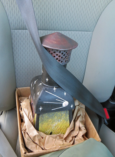 Ceramic Incinerator Boxed and Buckled Into A Seatbelt