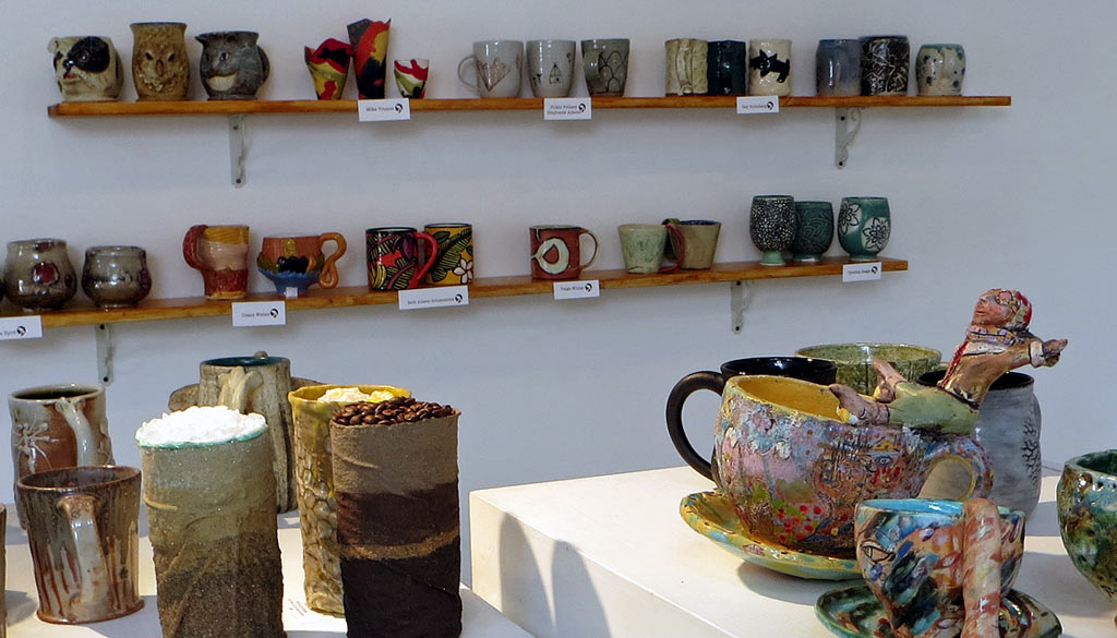 Wide shot of lots of ceramic mugs at The Radius Gallery