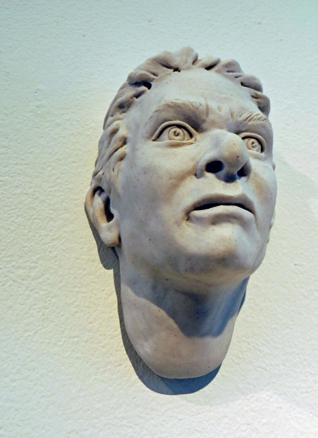 small ceramic portrait wallpiece by Cynthia Siegel