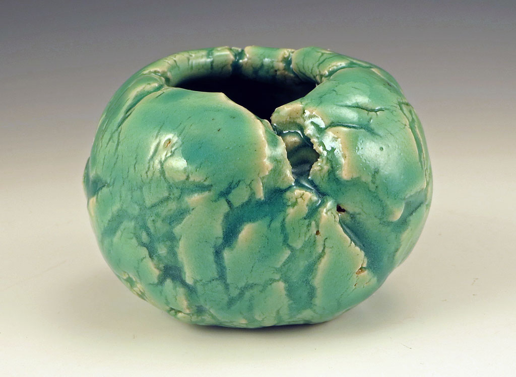 Celadon glazed cracked pinch pot