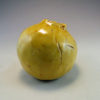 Pinch pot in yellow back