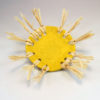 Yellow dish with raffia edging top angle