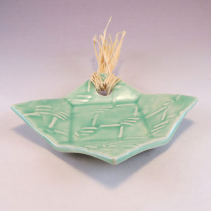 small aqua dish with raffia