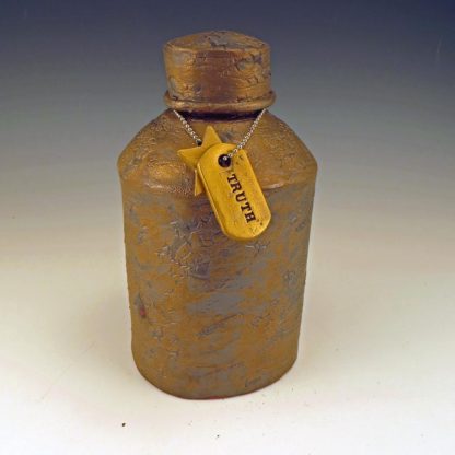 Golden Apothecary Bottle with "TRUTH" and Star Dogtags