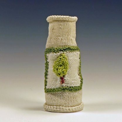 knitted porcelain vase with colored label