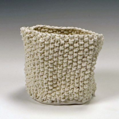 Knitted porcelain cup