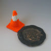 Traffic cone and pothole plate